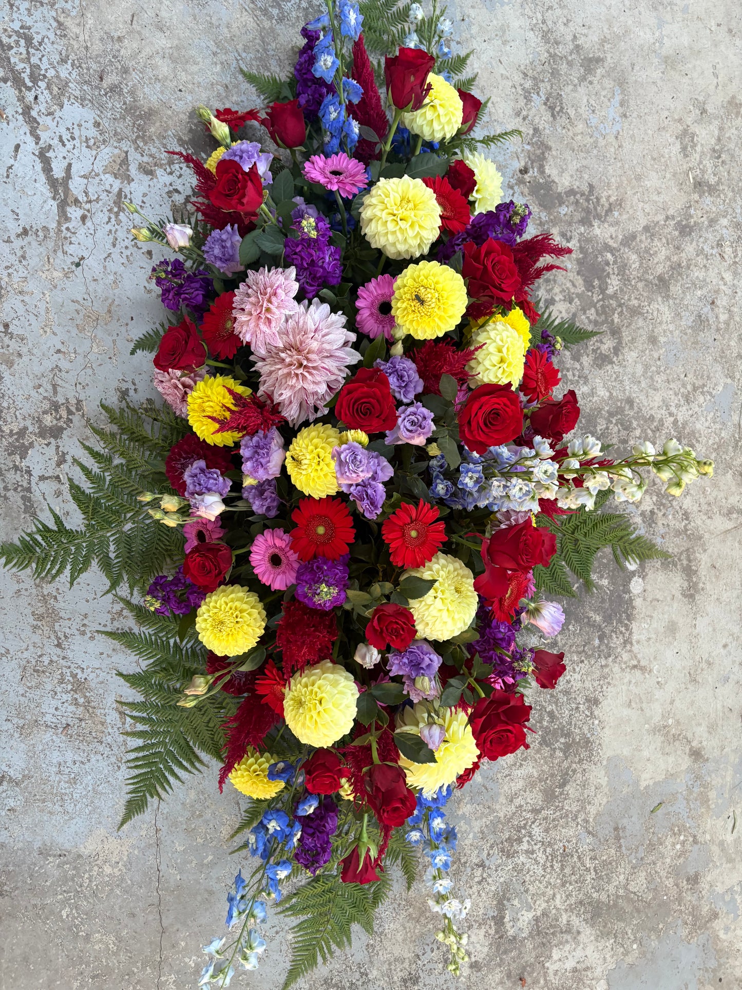 Red and Bright Mix Casket Arrangement