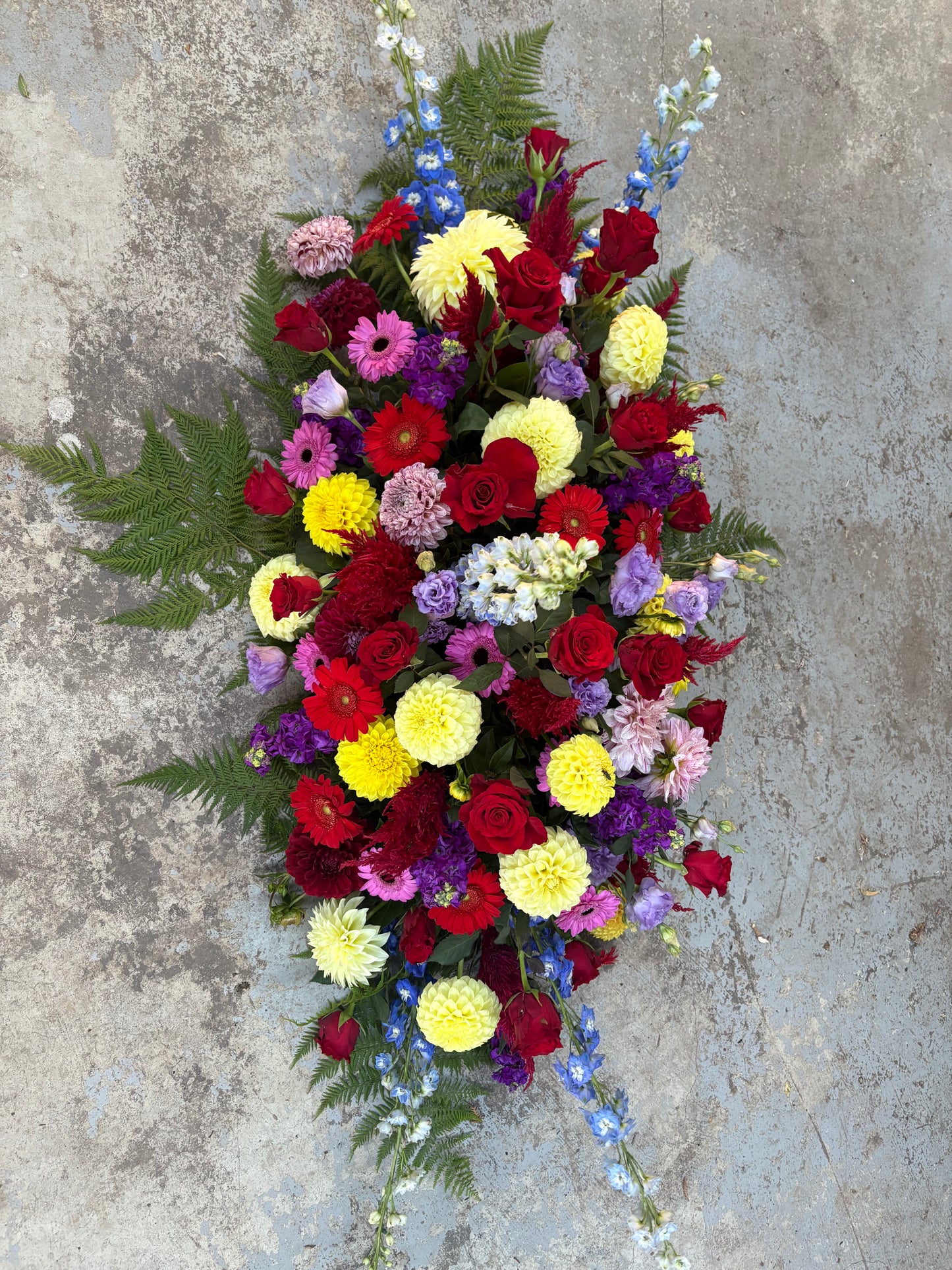 Red and Bright Mix Casket Arrangement